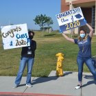 Enthusiastic WHC Lemoore staffers greeted a steady stream of drive-thru graduates.